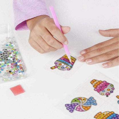 Close-up of a finished 3D diamond painting for kids, showcasing a detailed, framed butterfly.