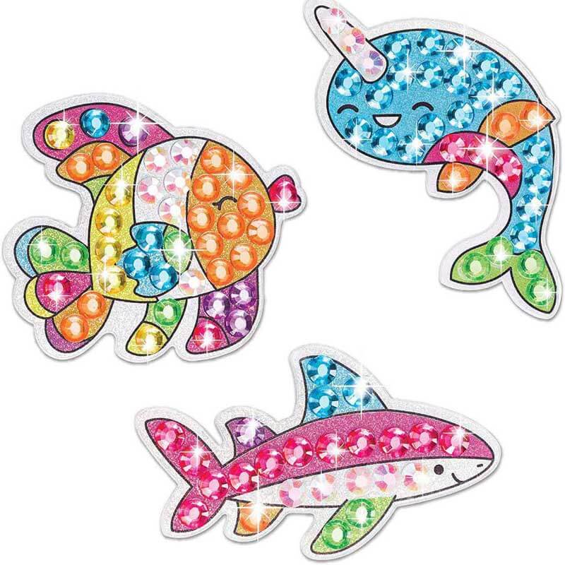 Assortment of kids' diamond painting kits with various designs like dinosaurs and planets, with frames.