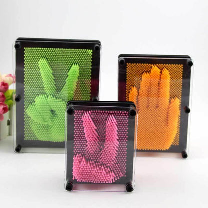 Kids 3D Pin Art Board, a creative toy for children to sculpt shapes and patterns from plastic pins.