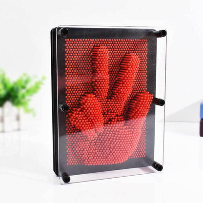 Different objects creating unique textures on a 3D Pin Art Board, ideal for sensory exploration.