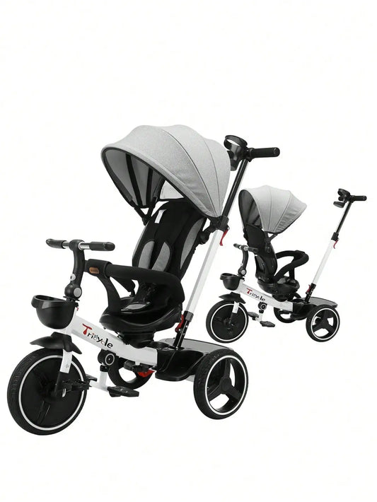 Kids' 6-in-1 Grow-with-Me Tricycle Stroller with parent handle, black, in a park setting