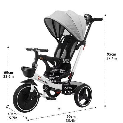 Toddler riding a black 6-in-1 Grow-with-Me Tricycle Stroller with parent push handle, outdoor play
