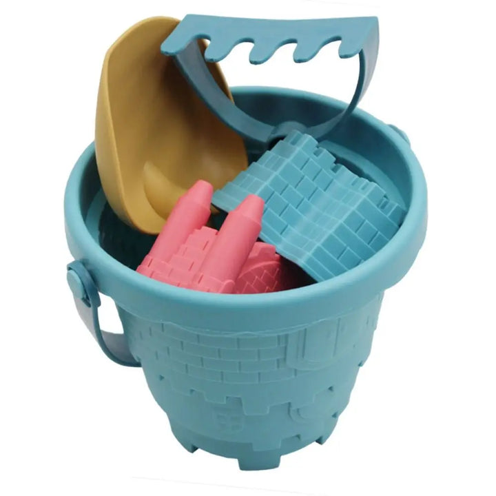 Green rake included in the 6-piece toddler beach sand play set, for smoothing sand surfaces