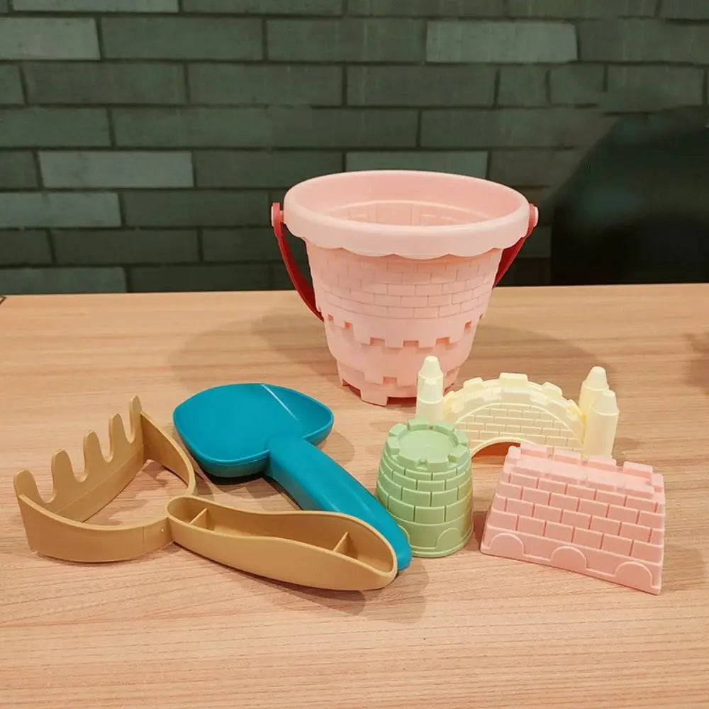 Collection of colorful sand molds from the 6-piece kids' beach toy set, for creative play