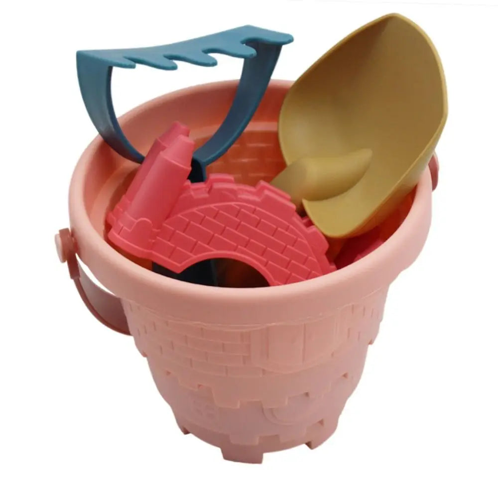 Overview of the 6 components of the kids' beach sand toy set, ready for sandcastle creation