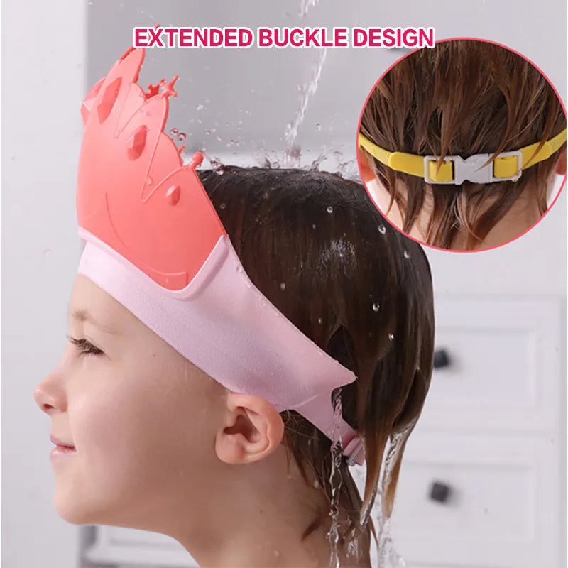 Green adjustable kids shower cap with a cartoon crown, waterproof and comfortable for baby bath time.