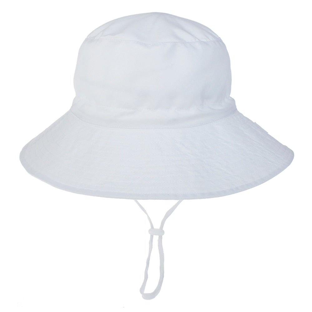 Baby accessory: Adjustable sun hat with UV protection, showcasing a friendly lion face on yellow fabric