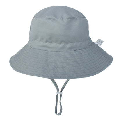 Adjustable kids' sun hat, light blue with cloud and rainbow pattern, wide brim for effective UV protection