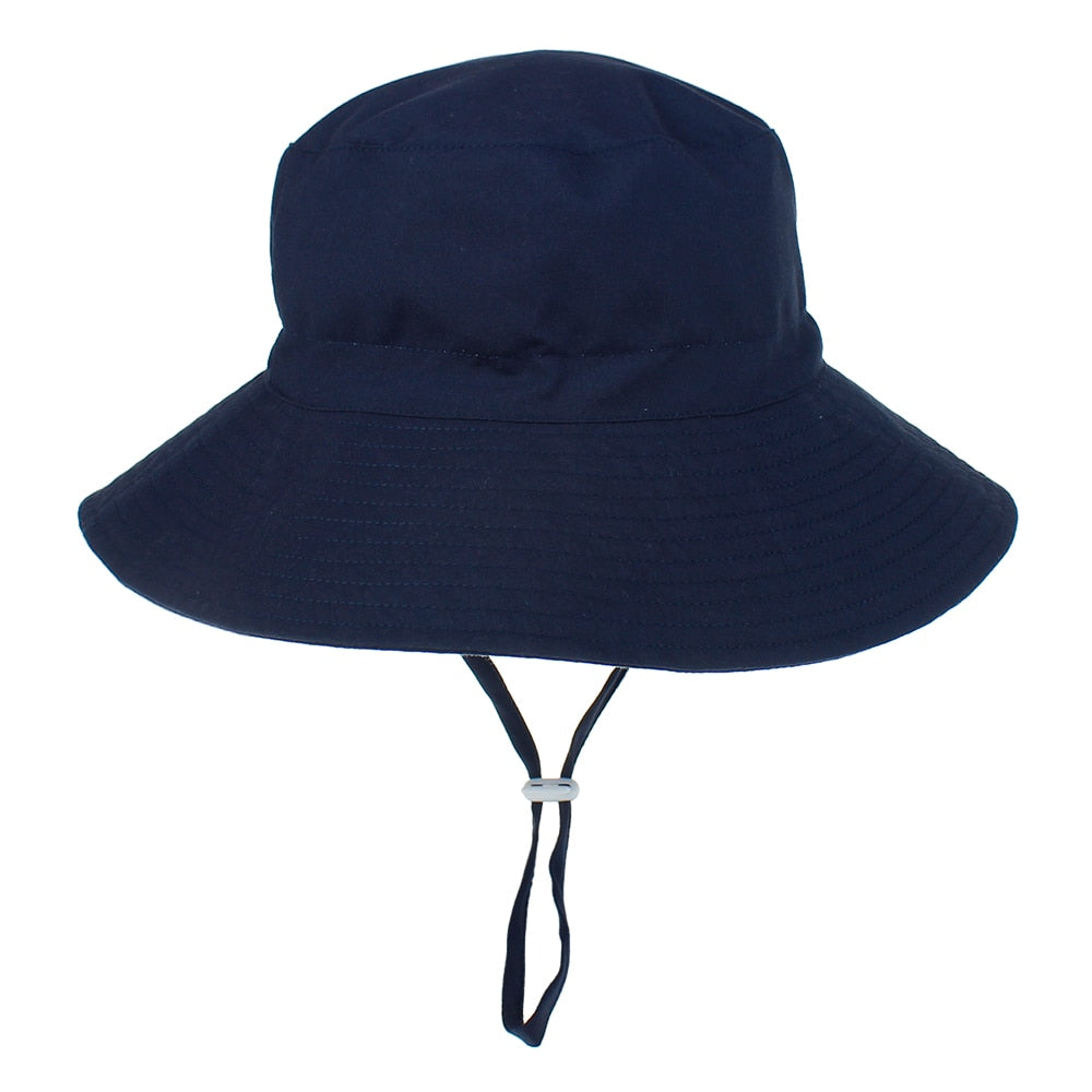 Kids' adjustable sun hat in bright green, depicting a cute turtle, offering excellent UV protection