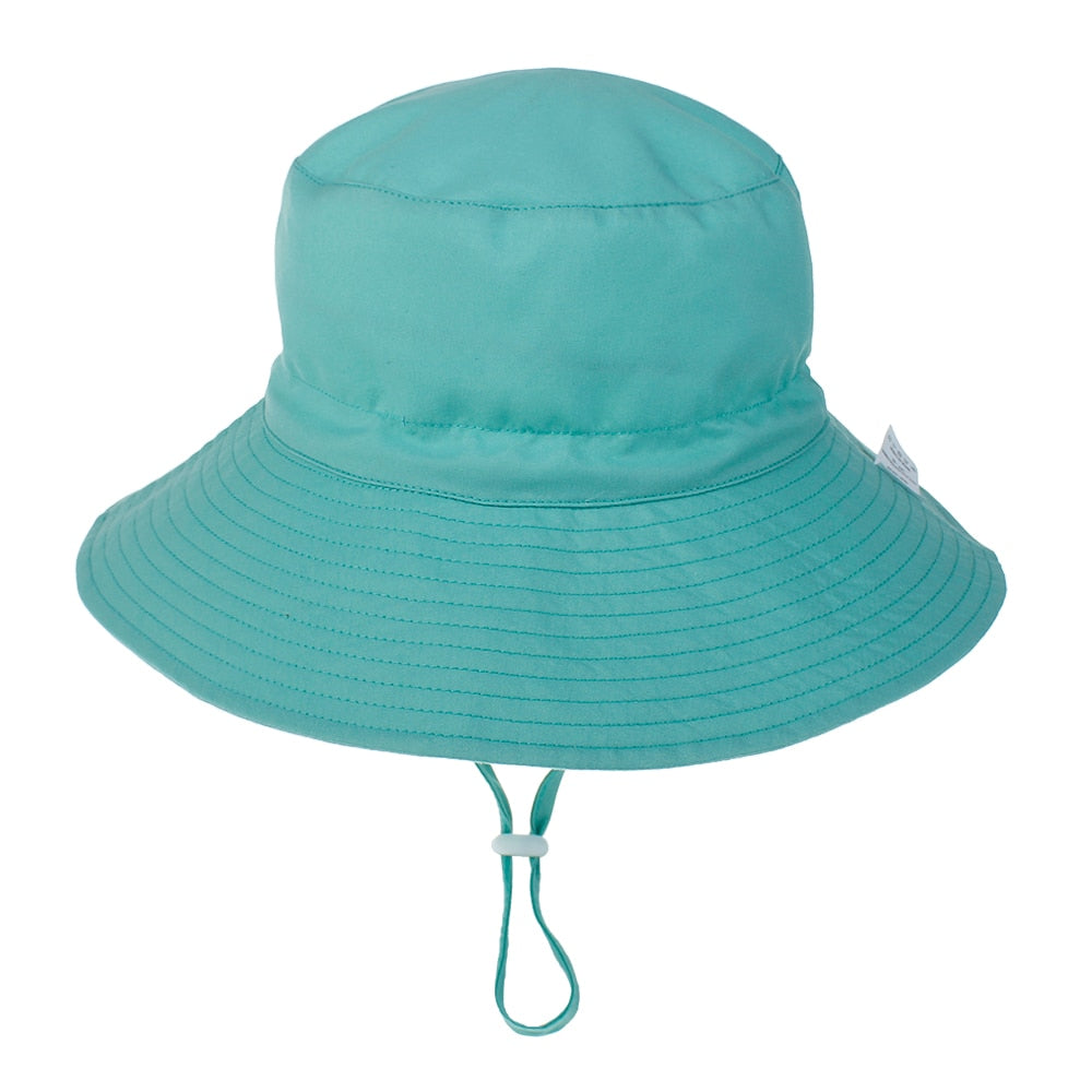 Baby accessory: Pink sun hat with wide brim, adjustable chin strap, and embroidered butterfly, UV protection