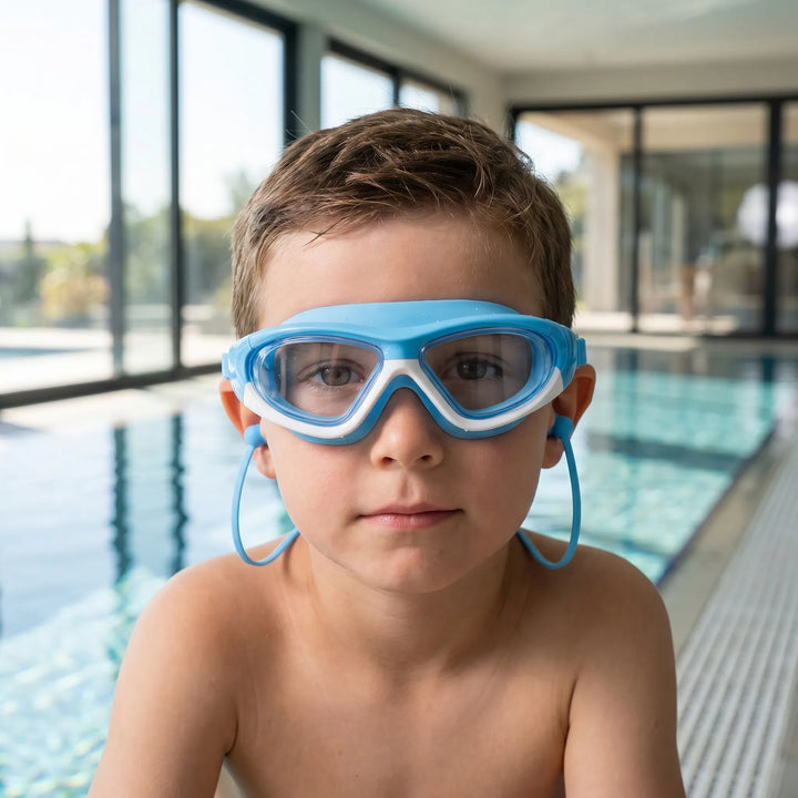 Kids' anti-fog swim goggles with integrated earplugs for comfortable swimming & UV protection.