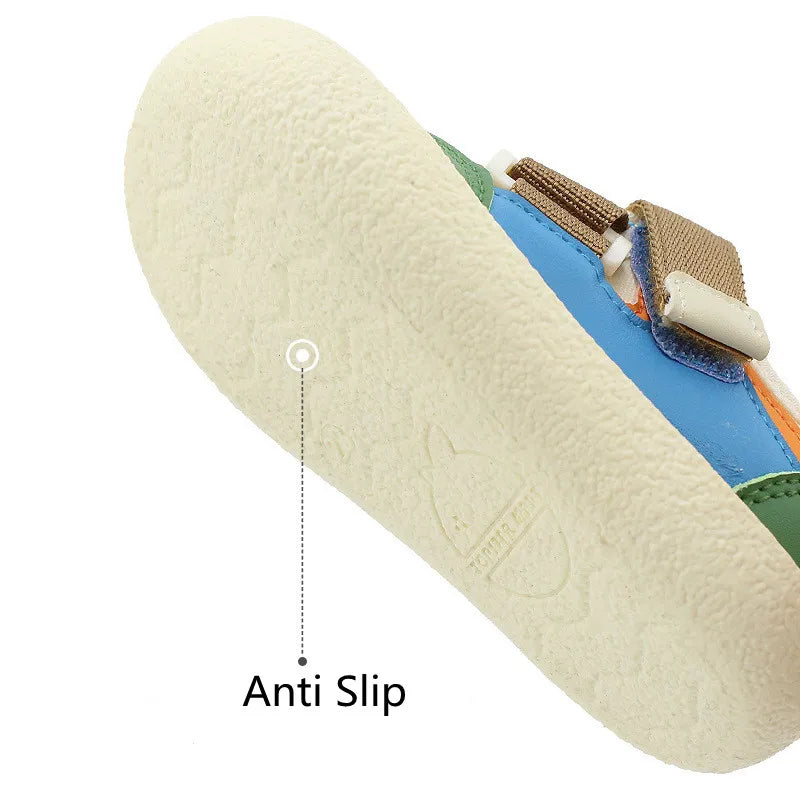 Toddler wearing green anti-slip summer play sandals, running on grass