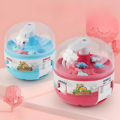 Kids' arcade dinosaur claw machine toy with miniature dinos, perfect for interactive play