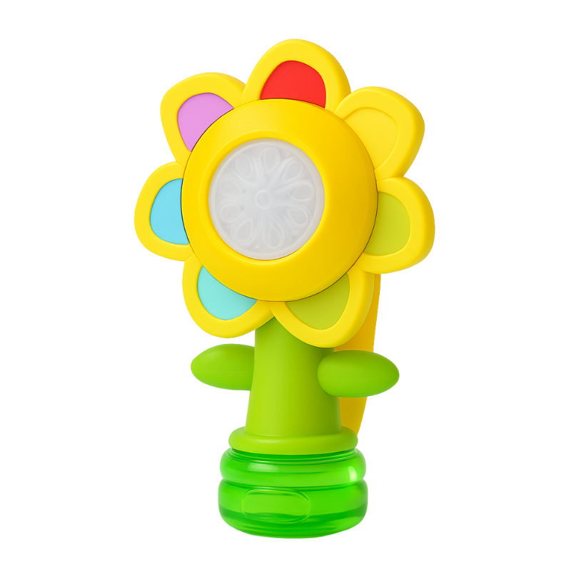 Toddler reaching for bubbles from an automatic flower-shaped bubble machine for parties