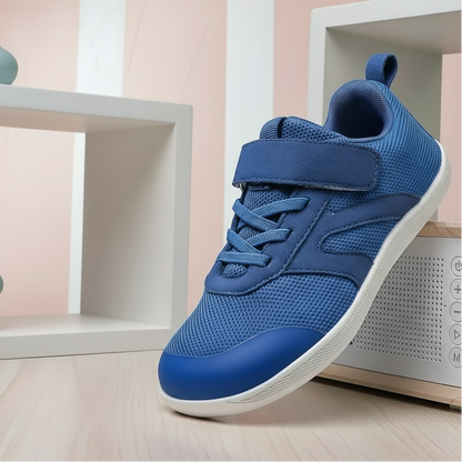 Unboxing new kids' non-slip barefoot sneakers, highlighting their lightweight and breathable features
