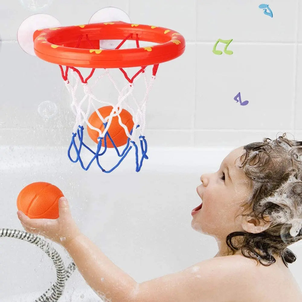 Toddler playing with bath basketball hoop and soft ball, promoting active water play