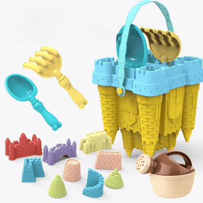 Creative sandcastle bucket kit for children, featuring a vibrant red bucket and various sand tools for beach or sandbox play.