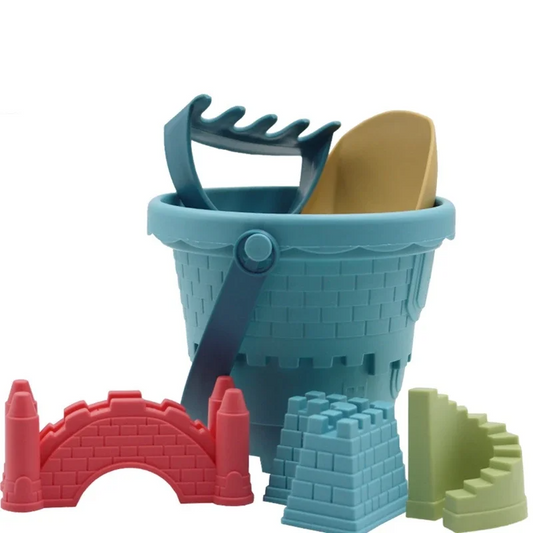 Kids beach sand toys set with colorful bucket, shovel, rake, and molds for sensory play.