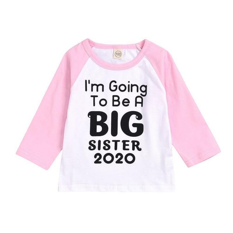 Kids 'Big Sister' pregnancy reveal t-shirt in white cotton, perfect for toddler baby announcement.