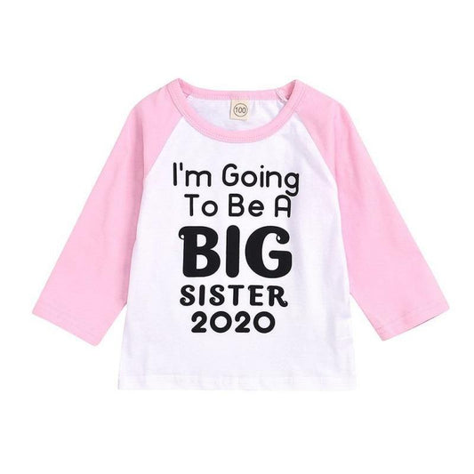 Kids 'Big Sister' pregnancy reveal t-shirt in white cotton, perfect for toddler baby announcement.