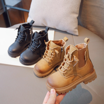 Kids' black leather lace-up combat boots, unisex design for winter fashion and durability.