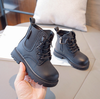Children's waterproof lace-up combat boots in a vibrant red, ideal for outdoor play & winter.