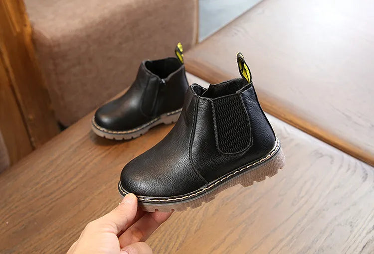 Toddler's first winter boots, black leather, zippered for easy fit, comfortable and warm