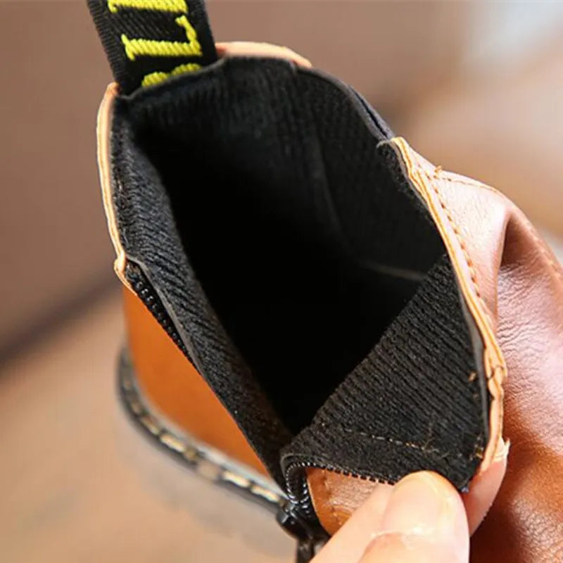 Durable kids' black winter boots with sturdy zipper, perfect for snow adventures and daily use