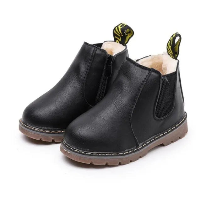 Toddler fashion boots, black leather and zippered, providing warmth and comfort in winter