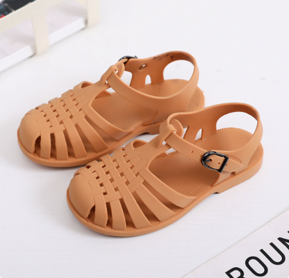 Pair of colorful kids' water shoes with anti-slip grip, ideal for summer activities