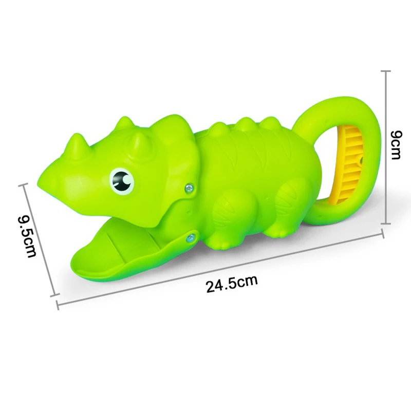 Dinosaur-shaped sand claw toy in green, inspiring imaginative kids' beach games