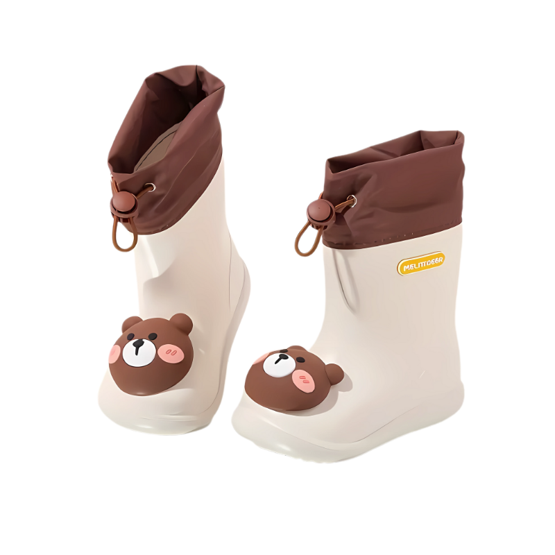 Close-up of a green bear character rain boot, showing waterproof material and sole