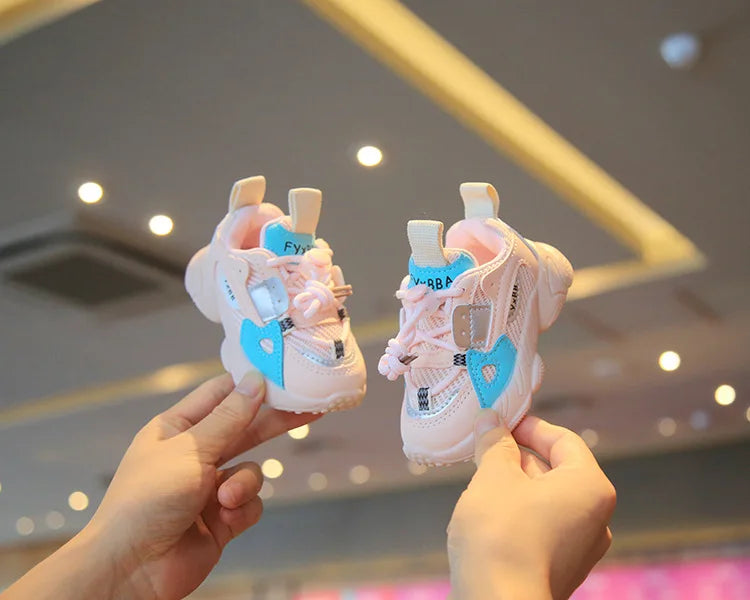 Back view of kids' sports shoes showing comfortable ankle support