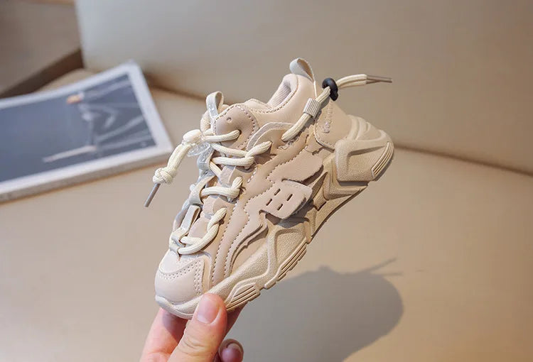 Close-up of the plush lining in kids' waterproof sports sneakers, highlighting comfort for boys & girls