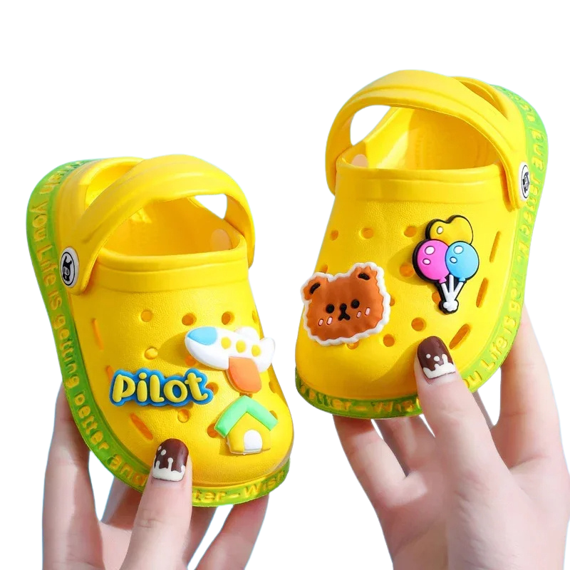 Multi-colored kids' slip-on summer clogs arranged, showcasing various vibrant options for children