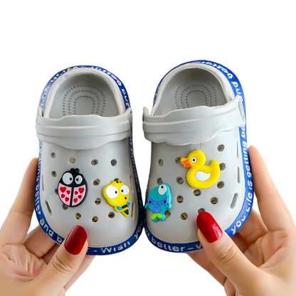 Set of different colored kids' slip-on clogs with back straps, ideal breathable summer footwear