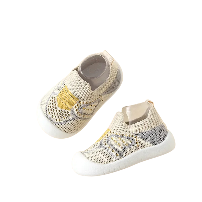 Close-up of kids' breathable sneaker with durable non-slip sole and cotton mesh upper for comfort.