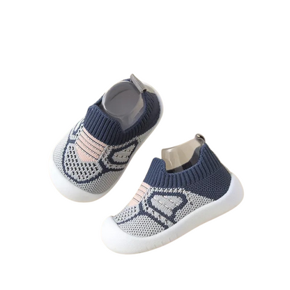 Baby walking shoes, machine washable with anti-slip grip for safety during active play outdoors.