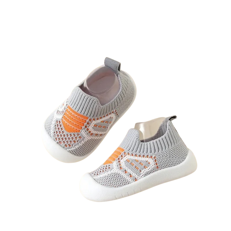 Children's playing in ergonomic, comfortable kids sneakers featuring a strong anti-slip design.