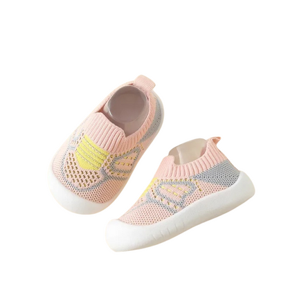 Side view of blue cotton mesh kids' sneakers, highlighting breathability and non-slip sole for toddlers.