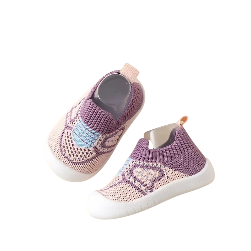 Pair of black non-slip kids' sneakers, designed for active outdoor play, machine washable and comfortable.