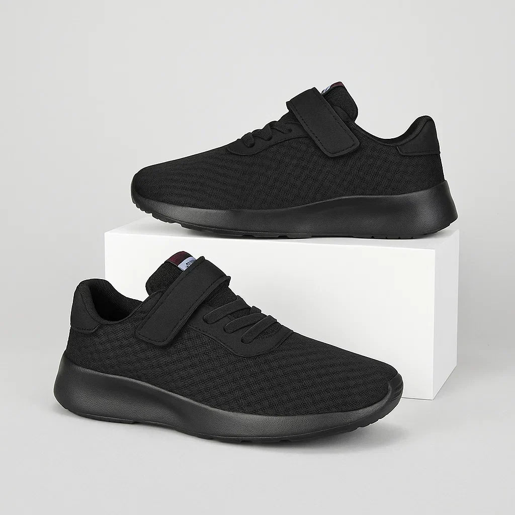 Front view of children's lightweight mesh sneakers, designed for ultimate breathability and comfort during activities.