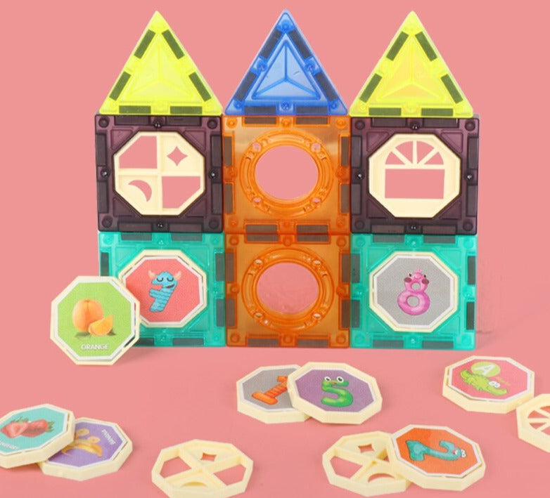 DIY magnetic building blocks forming an intricate marble track, interactive kids' toy.