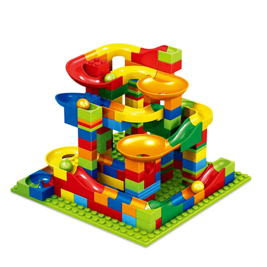 Kids building an interactive marble run track with colorful building blocks, educational STEM toy for creative play