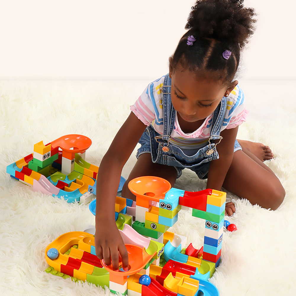 Detailed view of interconnected building blocks forming a complex marble run course, a challenging construction and puzzle toy