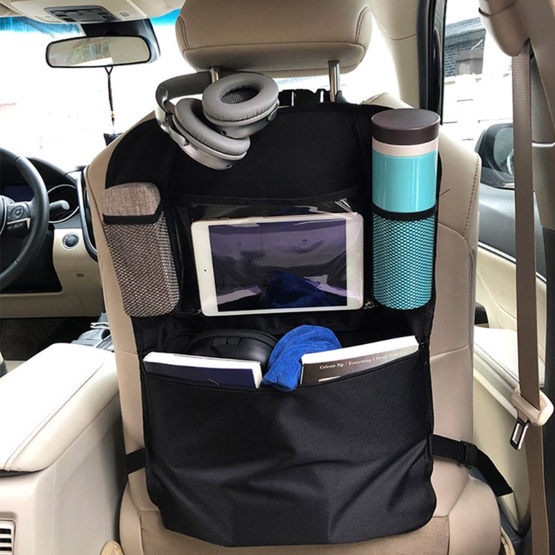 Kids' car seat back organizer, multi-pocket storage for toys & snacks, protecting car seats on road trips.