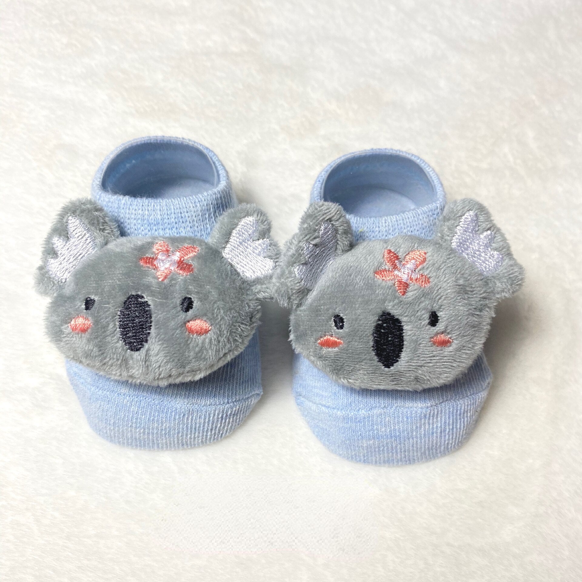 Close-up of a cute fox cartoon doll sock for kids, soft cotton toddler apparel