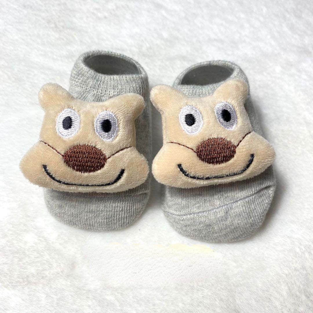 Baby socks with a smiling lion cartoon doll, premium cotton and anti-slip sole