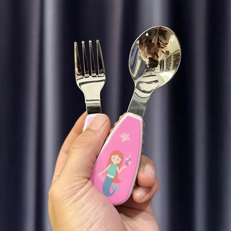 Vibrant kids' feeding set with a cartoon animal spoon, perfect for children learning to eat