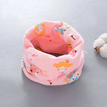 Toddler's soft neck wrap, black with cartoon dinosaurs, essential autumn fashion